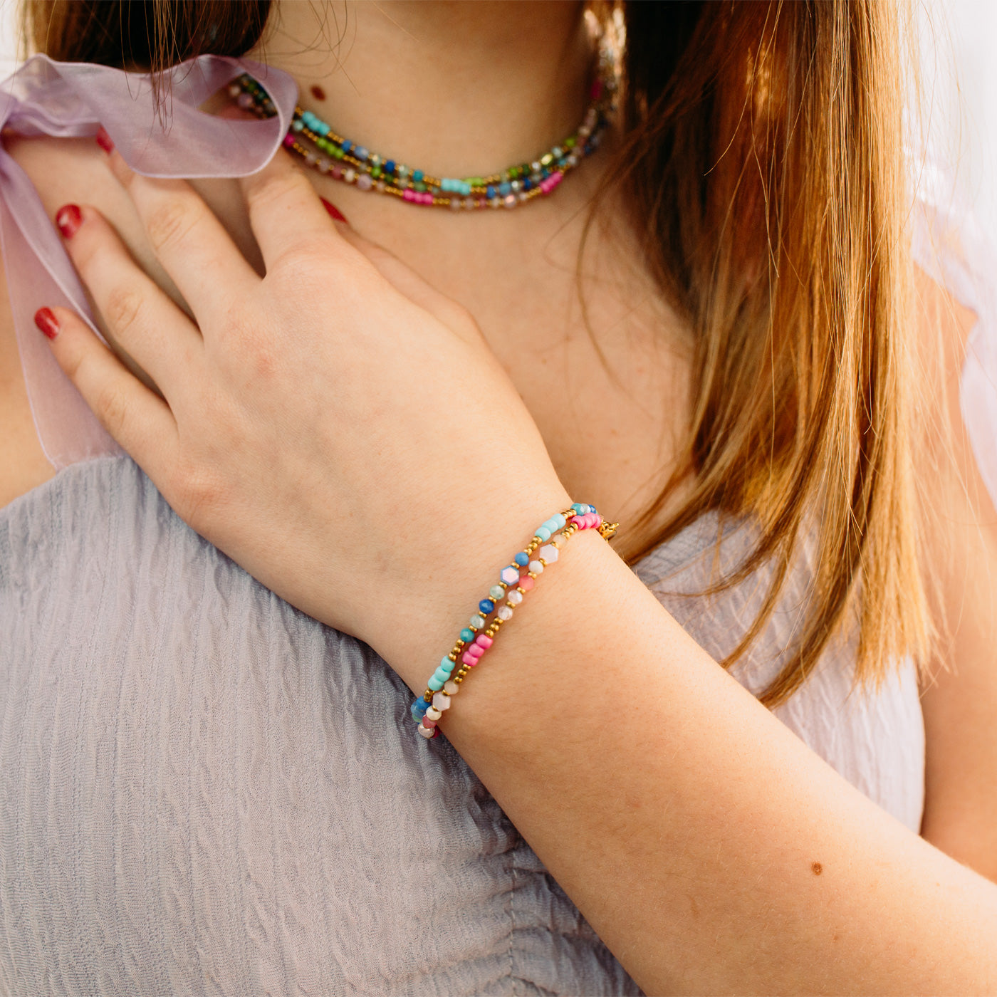 Julie Julsen KIDS Armband Edelstahl vergoldet mit pinken Glasperlen