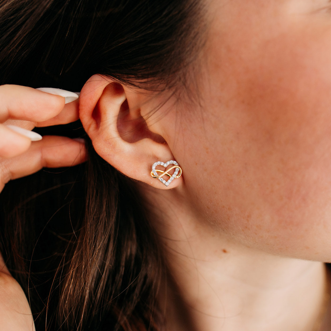 Julie Julsen Ohrstecker HEART INFINITY bicolor mit 36 Zirkonia