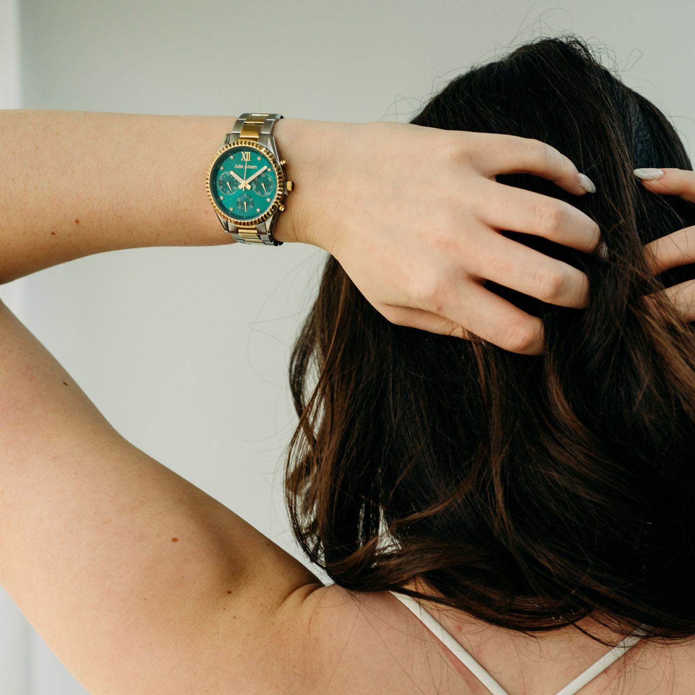 Julie Julsen Damenarmbanduhr SPORTIV MF vergoldet mit grünem Zifferblatt und bicolor Edelstahlband 5 atm
