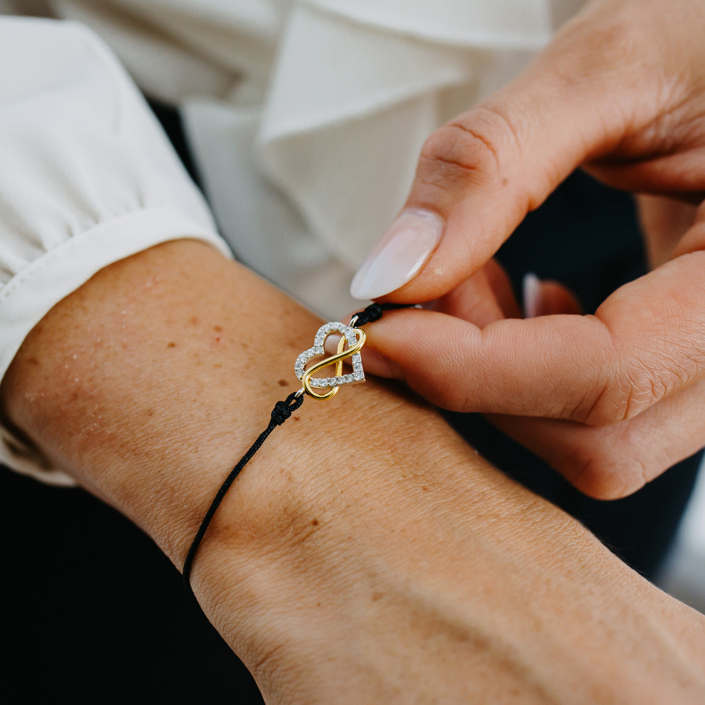 Julie Julsen Armband INFINITY HEART silber mit 20 weiße Zirkonia