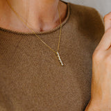 Julie Julsen Kette mit Anhänger CRYSTAL LINE vergoldet mit 5 weiße Zirkonia